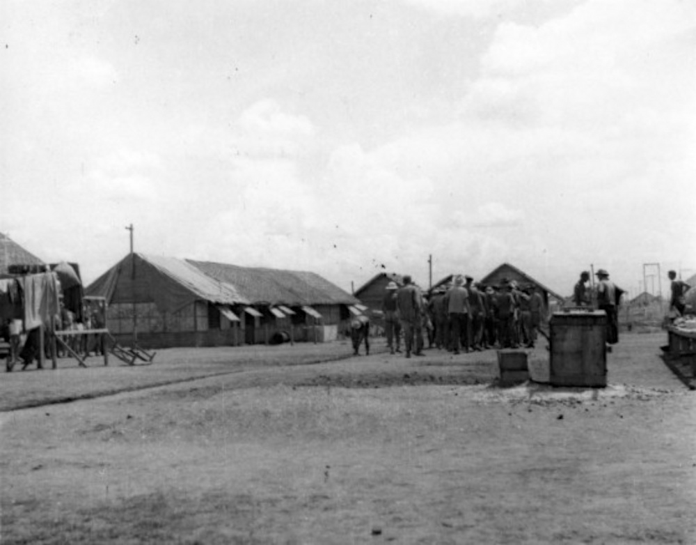 Marching Prisoners at Cabantuan POW Camp in The Philippines during WW2