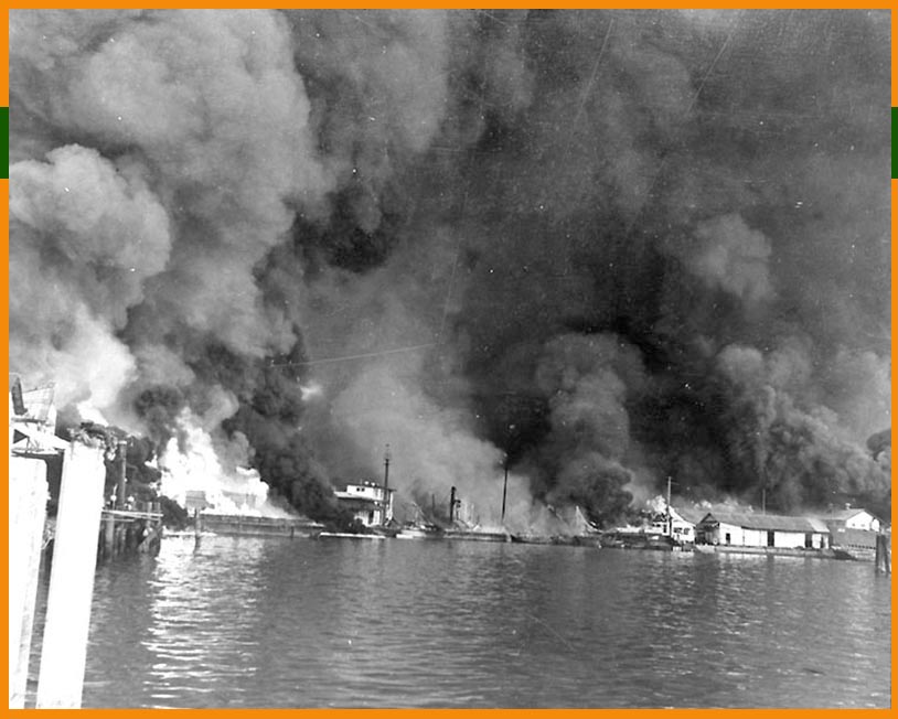 Cavite Navy Yard and US WW2 Navy ships buring in The Philippines