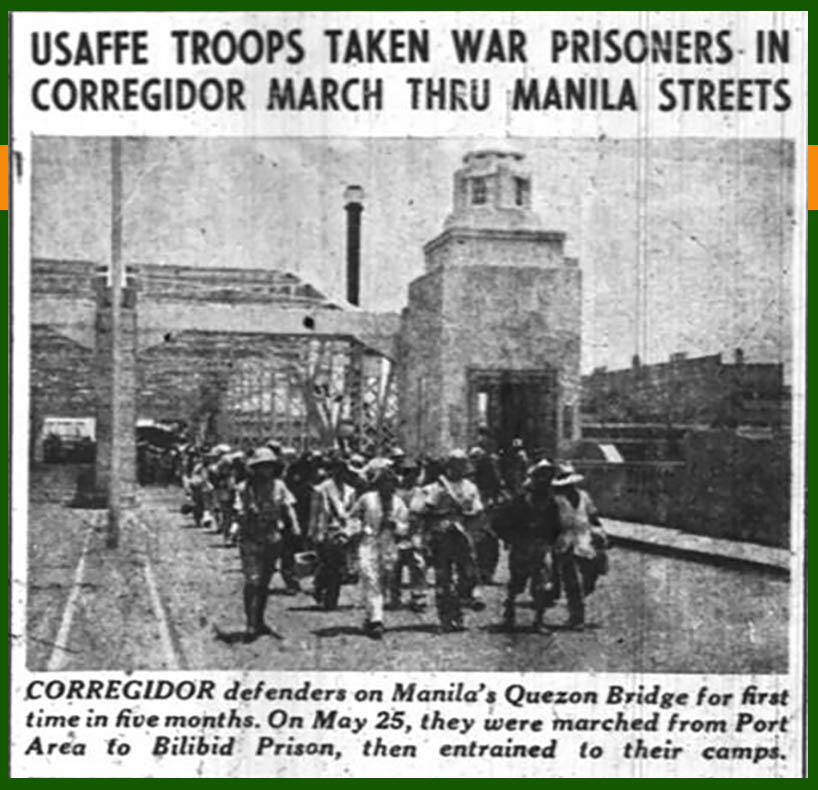 American POWs marching across a bridge in Manila durring ww2